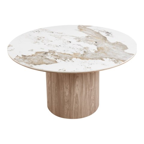 Ceramiczny stół okrągły Seramikkusu 140 cm ukazujący nieregularny, kamienny wzór blatu i jasną podstawę.